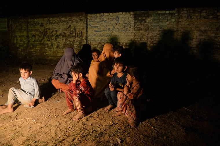 After evacuating her home in Muridke, a family gathered about 30 km from Lahore on May 7, 2025.