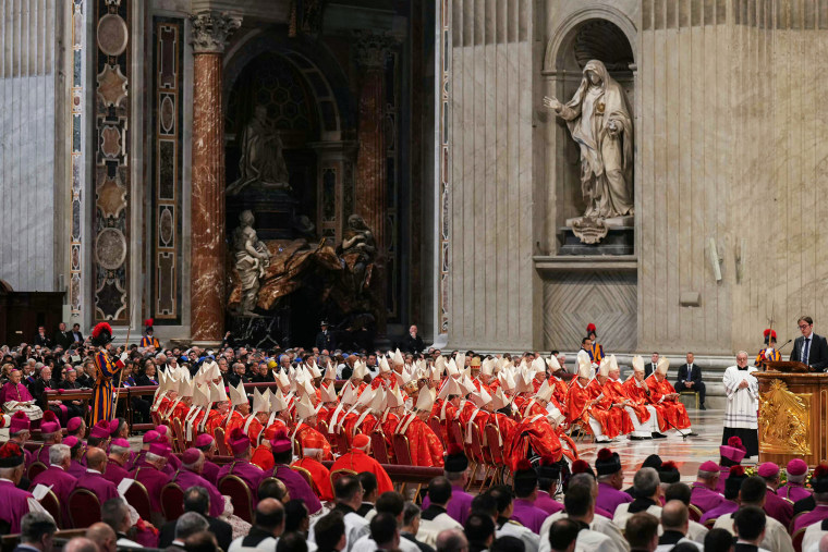 Cardinals attend a mass, prior to the start of the conclave at St Peter's Basilica in the Vatican on May 7, 2025.