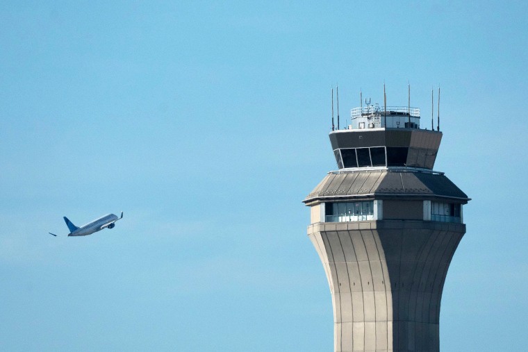 airtraffic control tower jet airplane fly