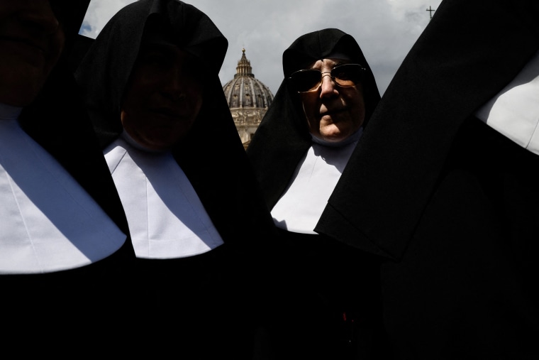 Nuns on St Peter's Square, near St. Peter's Basilica on Wednesday.