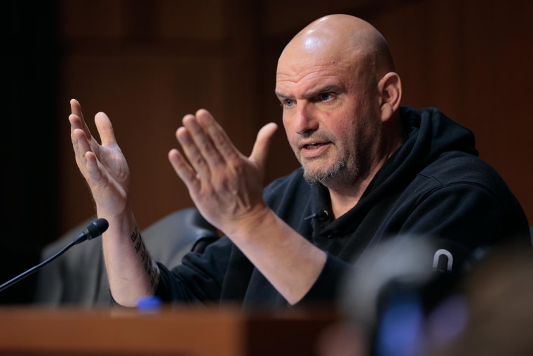 Sen. John Fetterman, D-Pa., questions tech leaders in artificial intelligence during a Senate hearing on May 8, 2025.