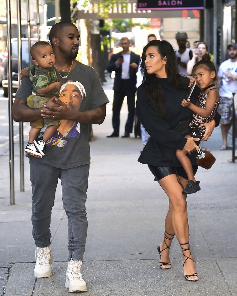 Kim Kardashian, Kanye West with North West and Saint West