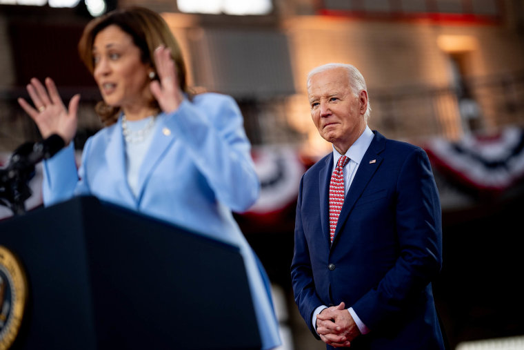 Kamala Harris standing at a lectern introduces Joe Biden during a campaign rally in Philadelphia, Pennsylvania.