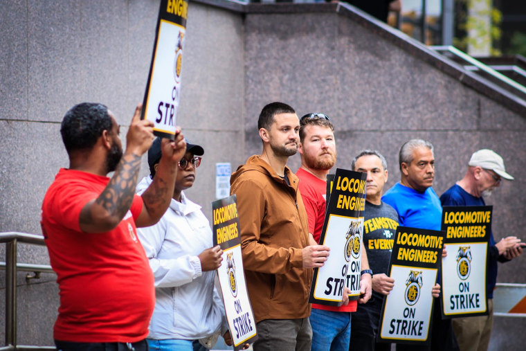 Members of the Brotherhood of Locomotive Engineers and Trainmen BLET Union strike outside New Jersey Transit headquarters on May 16, 2025 in Newark.