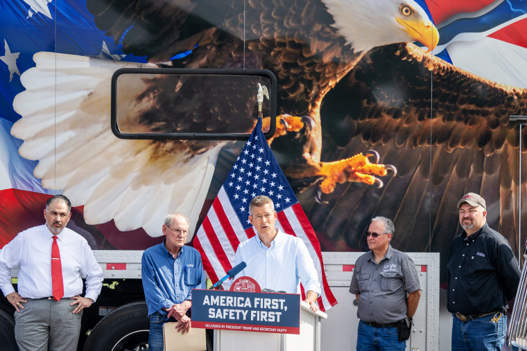 Sean Duffy speaking in front of a truck