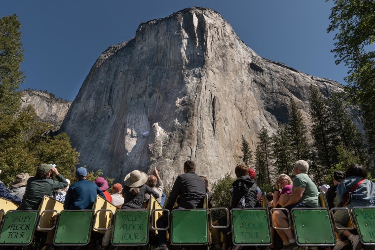 A group of trans, queer and ally climbers unfurled a massive transgender Pride flag on the face of Yosemite National Park's iconic El Capitan rock formation.