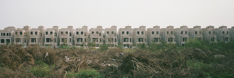 Luxury apartments under construction just north of Hanoi's West Lake. Foreign buyers dominate sales as property prices exceed local incomes.