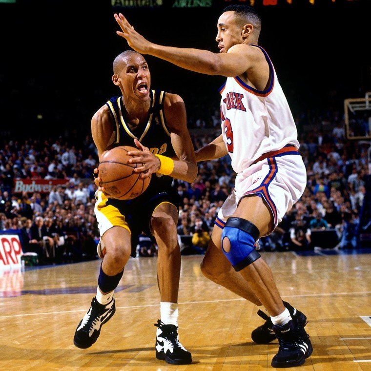 Reggie Miller of the Indiana Pacers looks to make a move against John Starks of the New York Knicks in Game 1 of the Eastern Conference Finals in 1994.