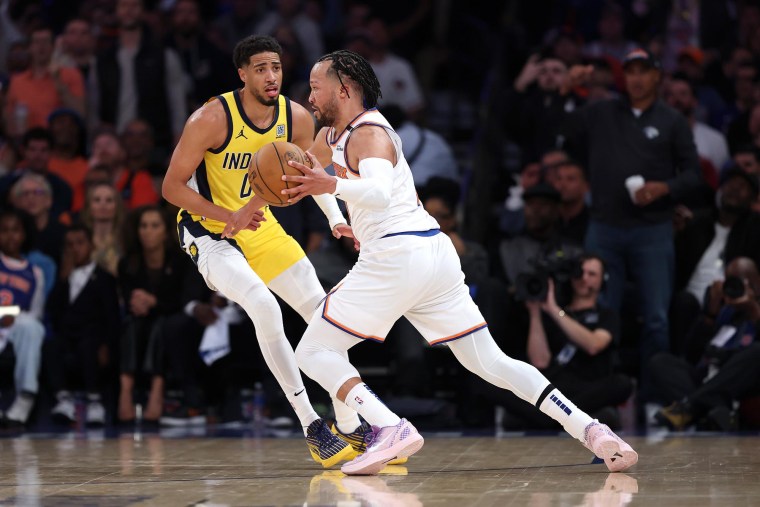 Jalen Brunson of the New York Knicks is defended by Tyrese Haliburton of the Indiana Pacers during Game One of the Eastern Conference Finals on May 21, 2025.