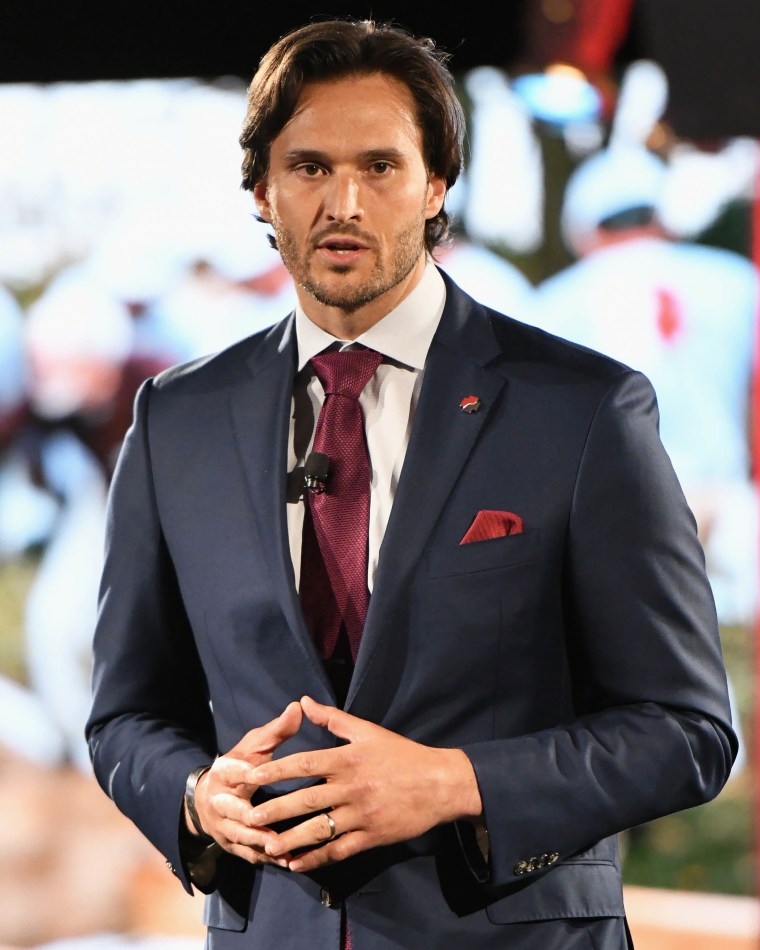 Jake Wood speaks on stage