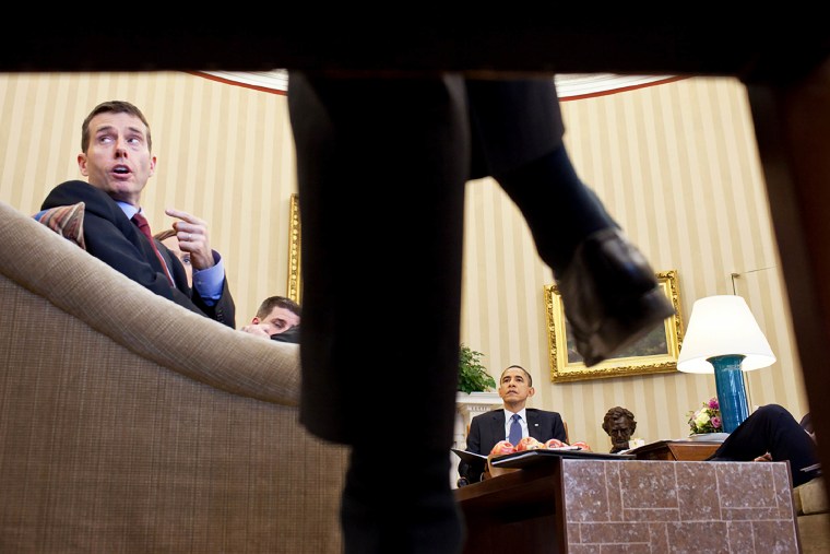 Senior Advisor David Plouffepepe takes a point during a meeting with President Barack Obama and senior employees in the Oval Office