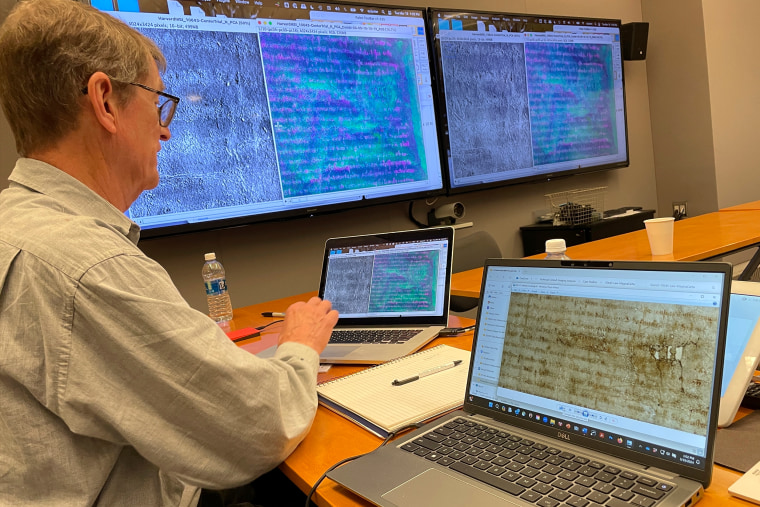 This photo provided by the Harvard Weissman Center shows imaging technology being used to help its librarians see details on a rare, faded copy of the Magna Carta from 1300 on March 19, 2024, in Cambridge, Mass.