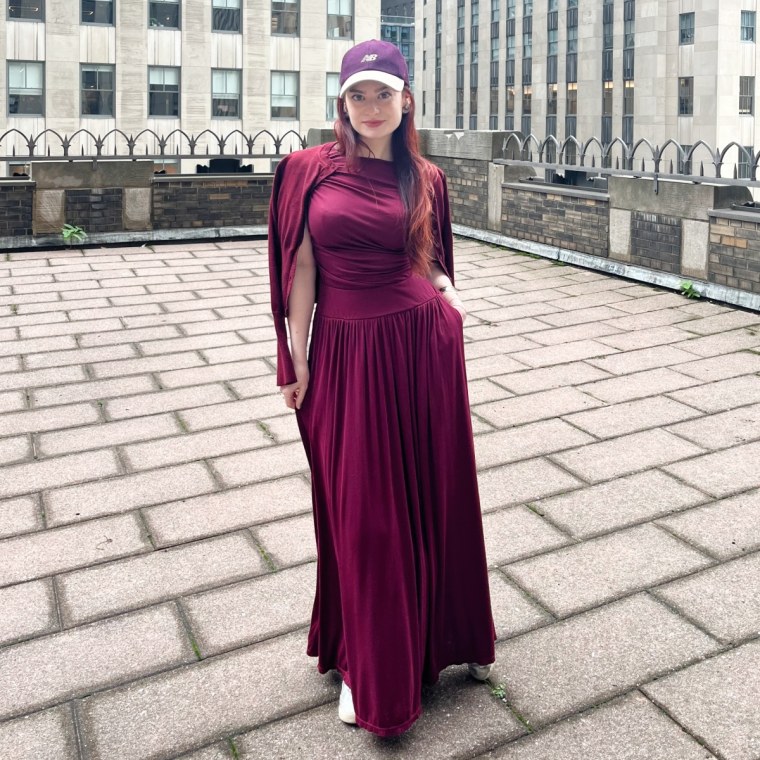 Here, I styled my Halara Boat Neck Maxi Dress with a cardigan, baseball cap and slim sneakers for an everyday look.