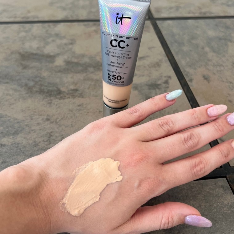 Woman with foundation on back of hand