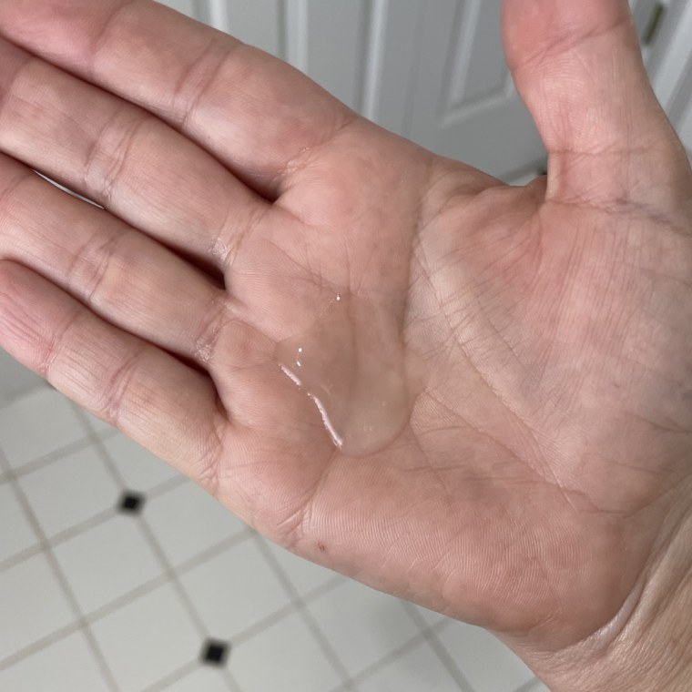 SickScience ShapeShift V-Line Jaw Defining Serum dispensed on hand.
