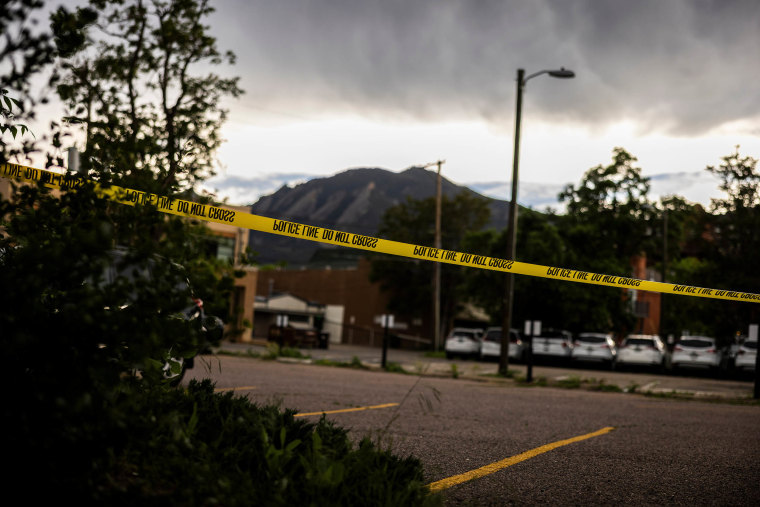 Police cordon off downtown in Boulder, Colorado. qhiukiuiqxhinv