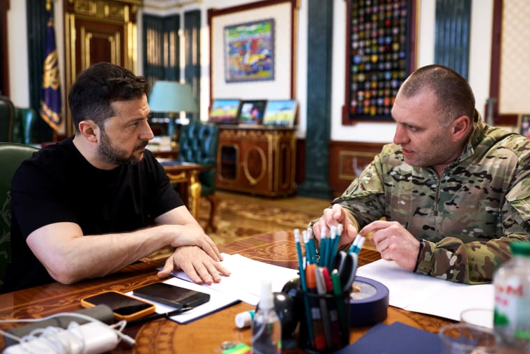 Ukrainian President Volodymyr Zelensky (L) meeting with the head of Ukraine's Security Service Vasyl Malyuk (R) in Kyiv