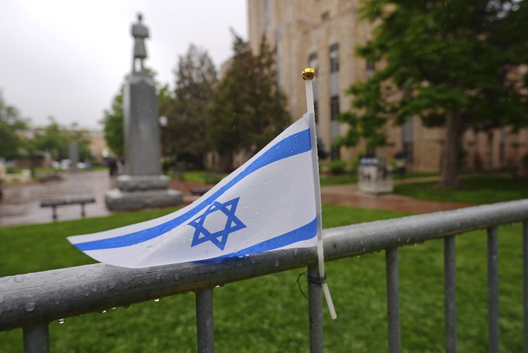 An Israeli flag at a makeshift memorial for victims of an attack outside of the Boulder County, Colo., courthouse on Tuesday, June 3, 2025.
