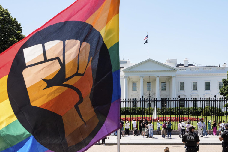 A Pride flag flies in front of the White House 