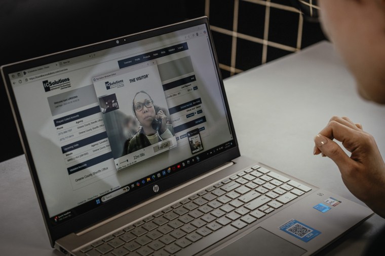Ming Li Hui, known to people as Carol, speaks from jail by video link to Liradona Ramadani, whose family owns the restaurant where Carol worked, in Kennett, Mo., May 26, 2025.