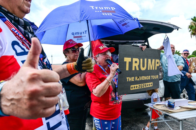 Donald Trump supporters prepare to start a caravan in Hialeah, Fla., on July 14, 2024. 