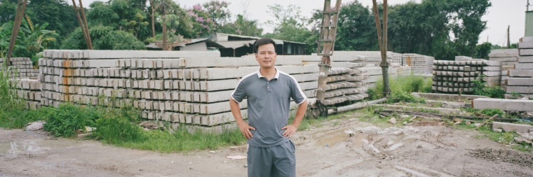 Hoang Văn Hữu, a manager at Thuỳ Đá Concrete in Hanoi.