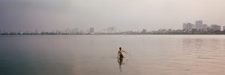Hanoi residents swim in West Lake.