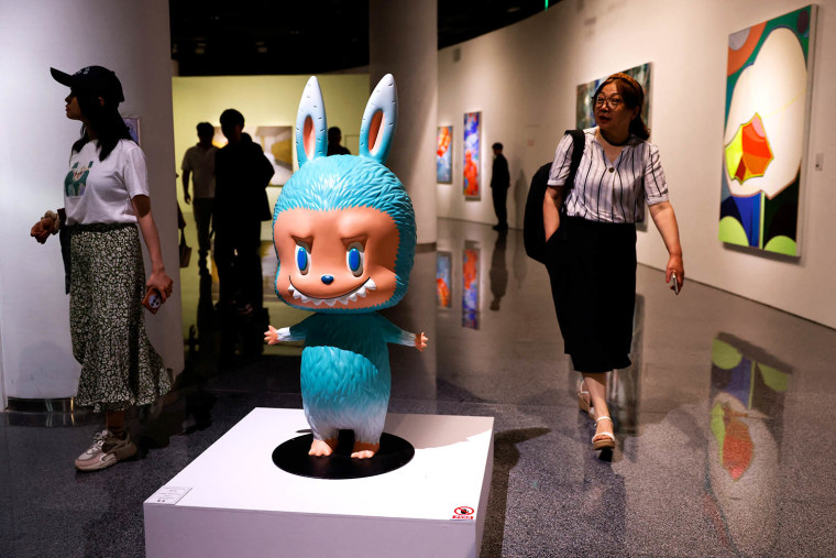Labubu figurine is displayed before an auction in Beijing