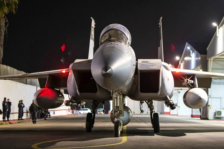 Armed Israeli air force planes depart from an unknown location to attack Iran in October.