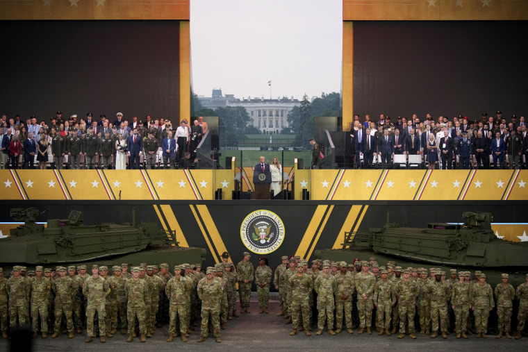 Trump presides over a military parade amid turmoil at home and abroad
