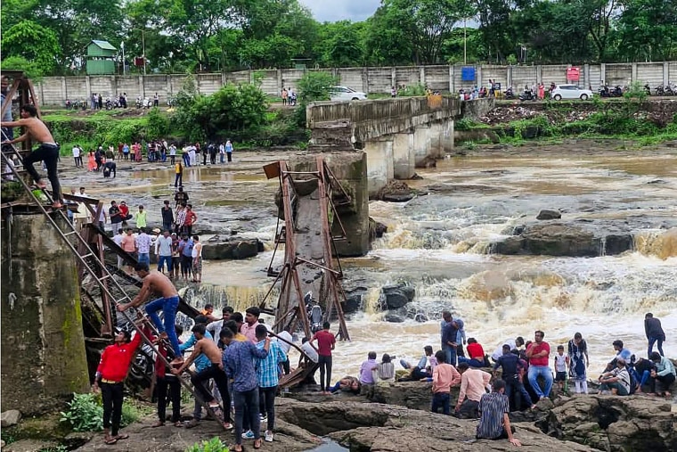 2 killed and 32 injured when a bridge collapses at a vacationer vacation spot in western India