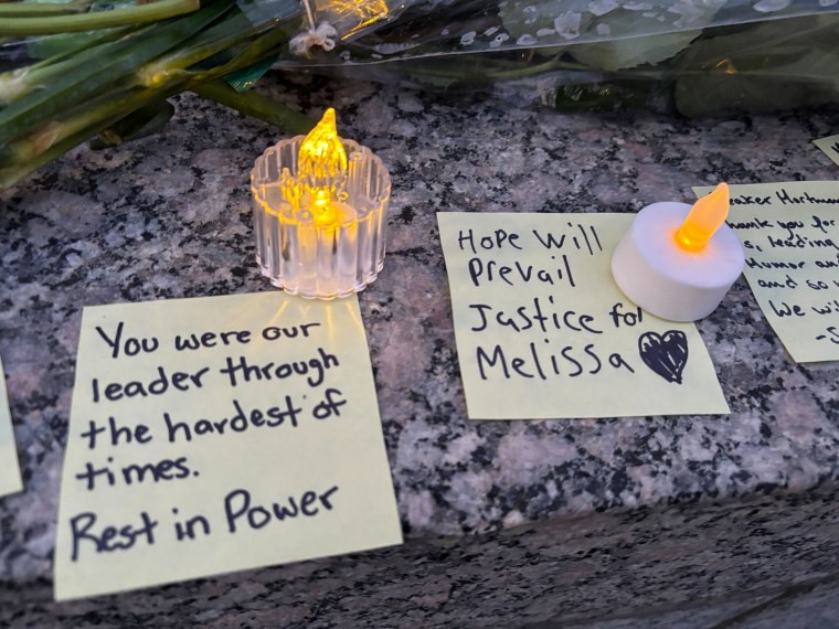 Sticky notes with "rest in peace" notes written for Melissa Hortman