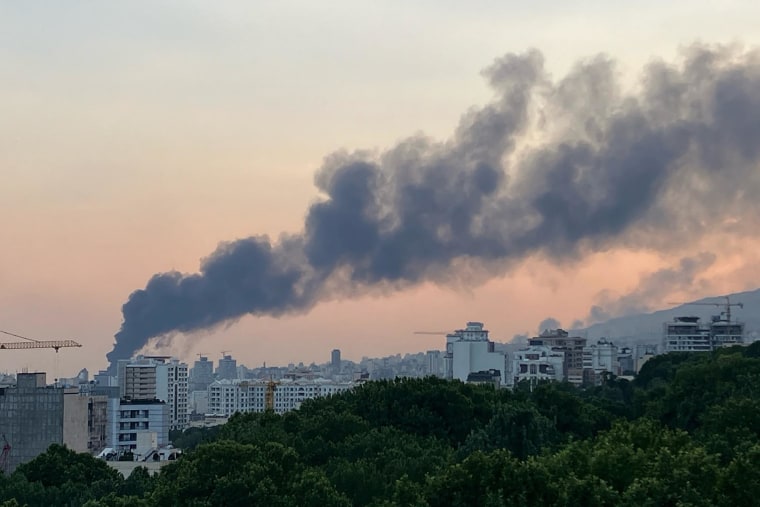 Smoke billows from an explosion at the Islamic Republic of Iran Broadcasting building in Tehran