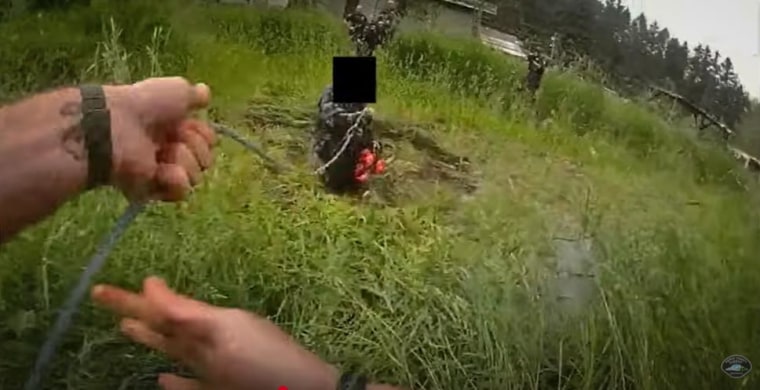 A deputy used a lasso to pull a man from a pond after he was reportedly chasing his father with a chainsaw