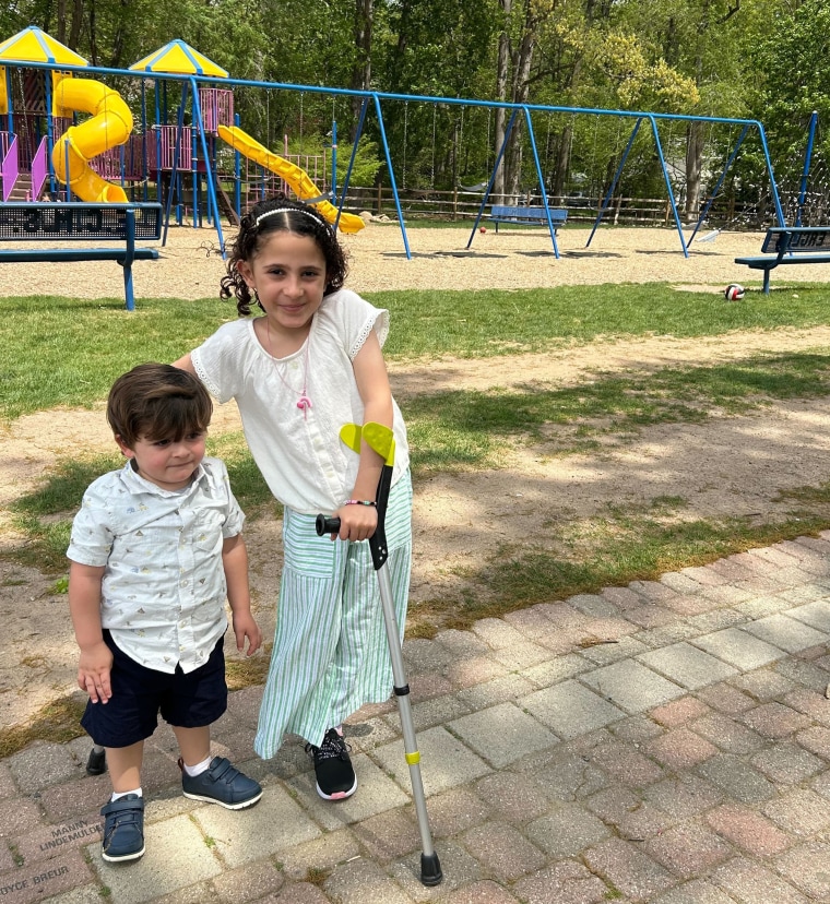 Qamar Alkordi with her brother.