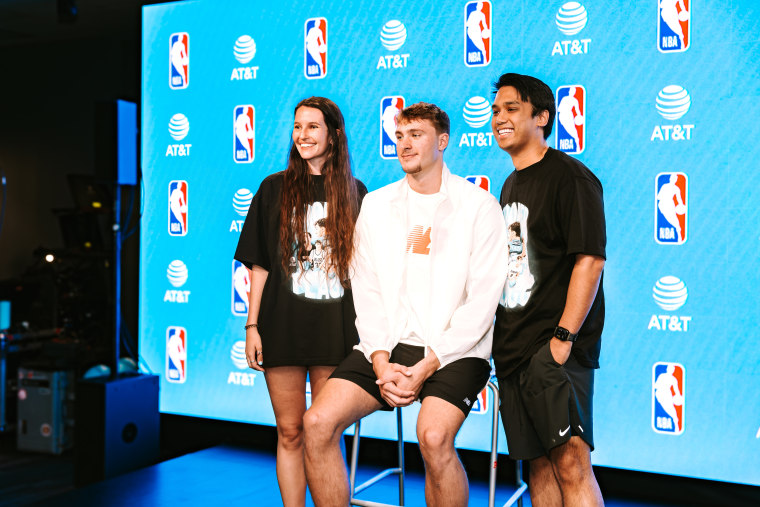 Cooper Flagg (center) with fans at the AT&T Flaggship Experience