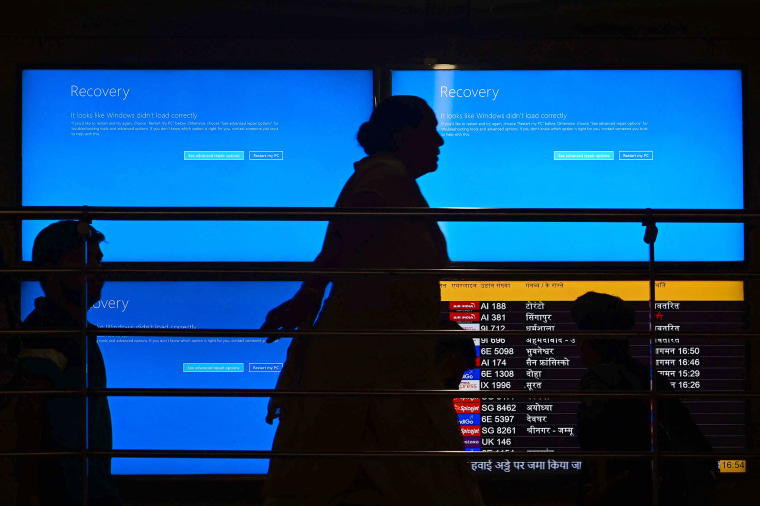 Crowdstrike Microsoft Tech Glitch Interrupt operations at Delhi Airports Screen of Death Recovery