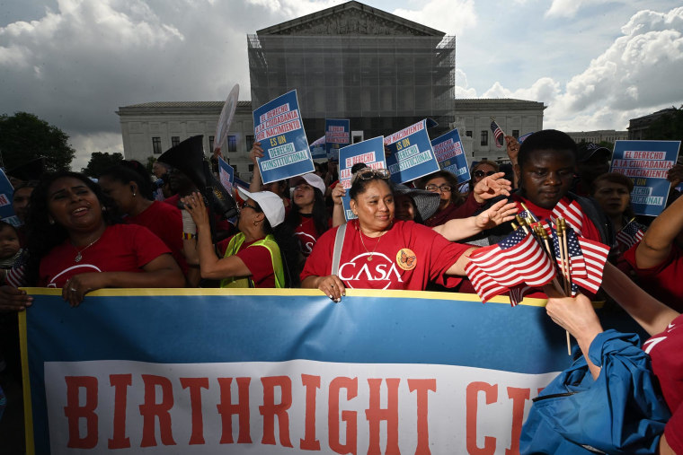 Demonstrators rally outside the Supreme Court in support of birthright citizenship