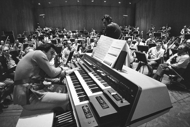 Lalo Schifrin, left, rehearses with the Los Angeles Philharmonic in Los Angeles in 1971.