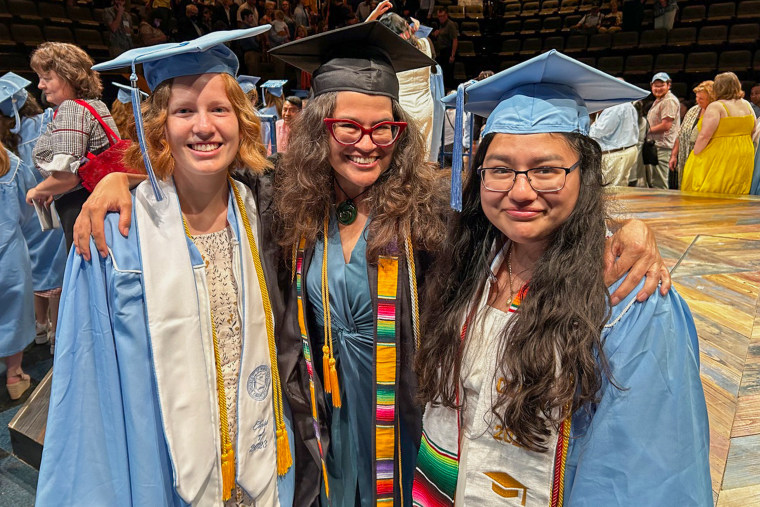 Stephanie Elizondo Griest at UNC-Chapel Hill graduation with Ruth Jeffers (l) and Teresa Vasquez.