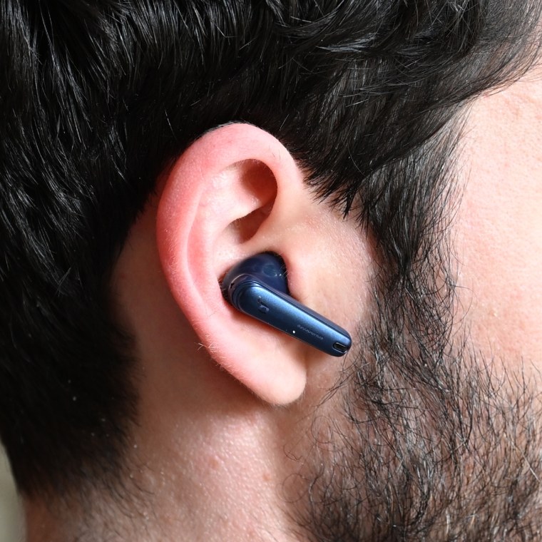 A close up of a Anker Soundcore Liberty 4 NC earbud in the ear of the writer.