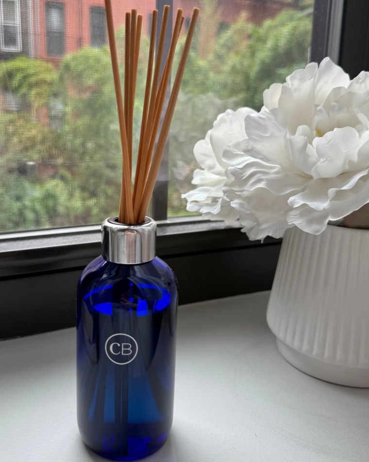A photo of the Capri Blue Volcano reed diffuser on a counter