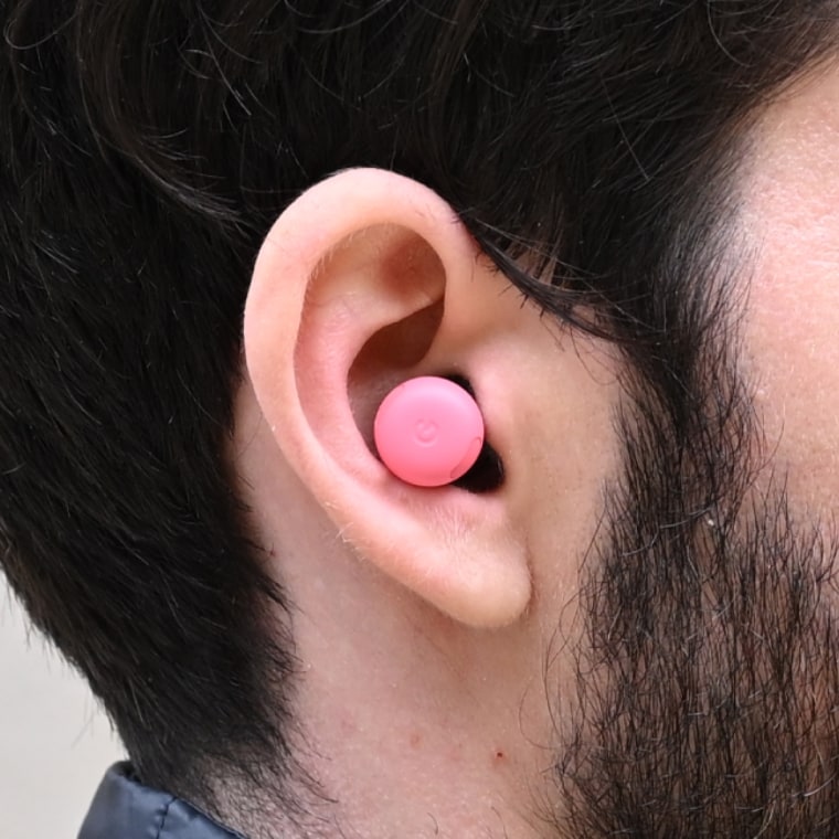 A closeup of the Google Pixel Buds Pro 2 earbuds in the ear of the writer.