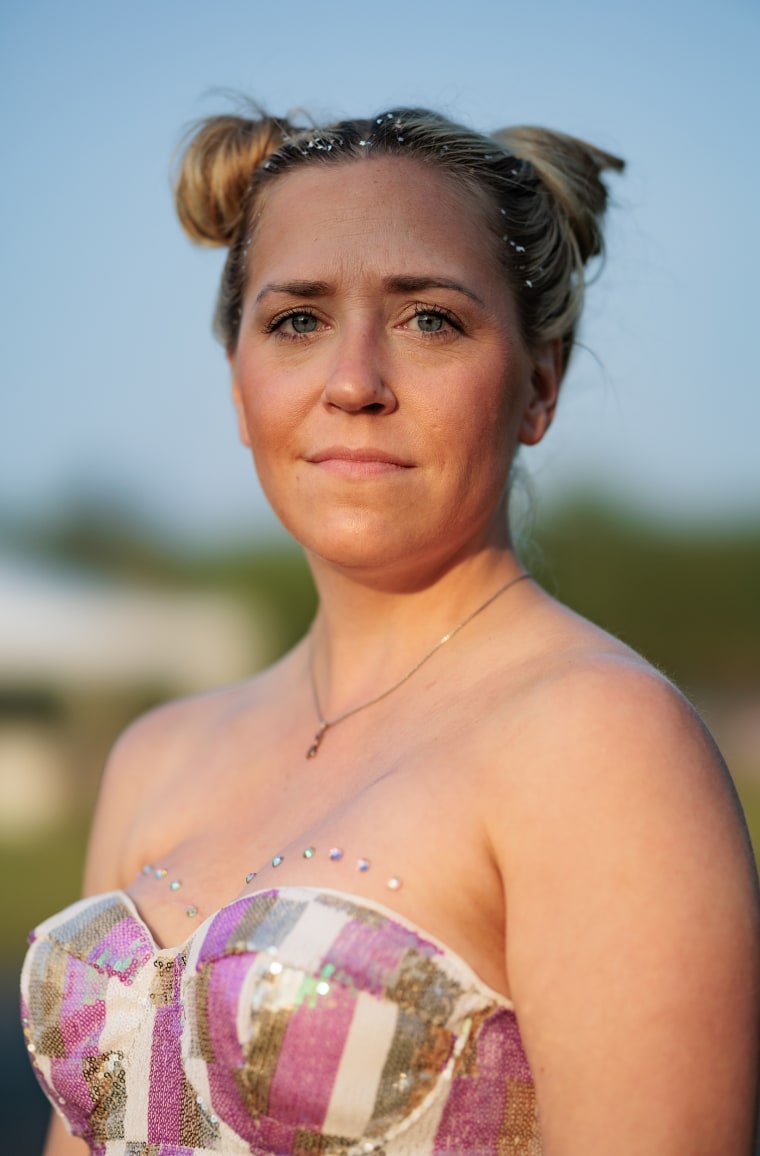Brooke Schneider, 34, poses for a portrait at Camp Breastie.