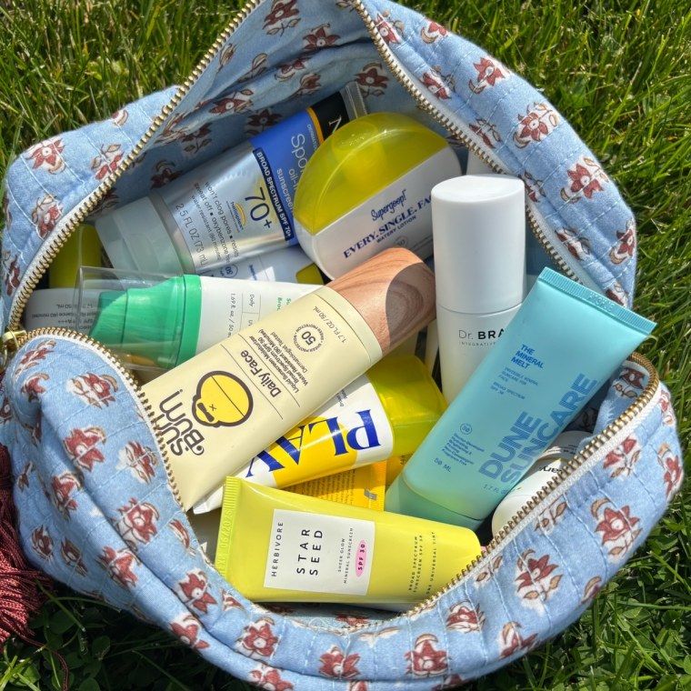 A cosmetic bag with many sunscreens