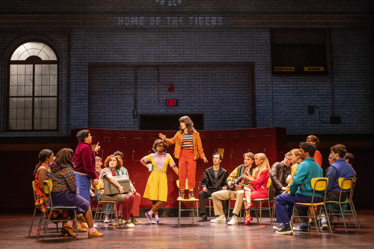 In "Stranger Things: The First Shadow," Joyce directs a school play featuring an eclectic group of characters like Alan Munson (Eddie Munson's dad) and Claudia Yount (Dustin Henderson's mom).