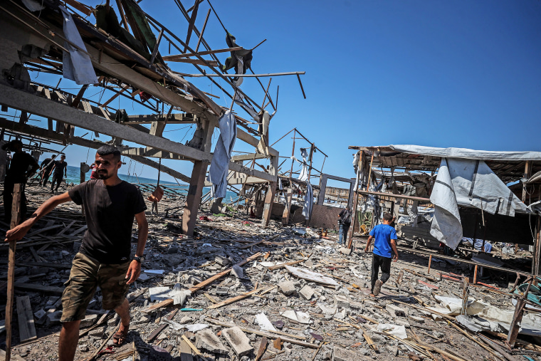 At least 74 killed as Israeli forces strike a Gaza cafe and fire on people  seeking food, health officials say