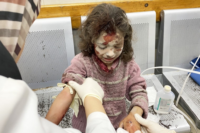 The Israeli military open fire on Palestinians who receive aid in Gaza