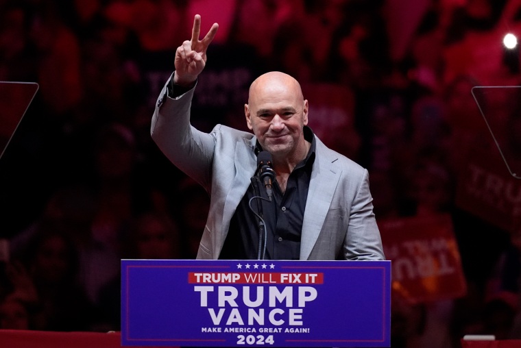 Dana White flashed a V sign.