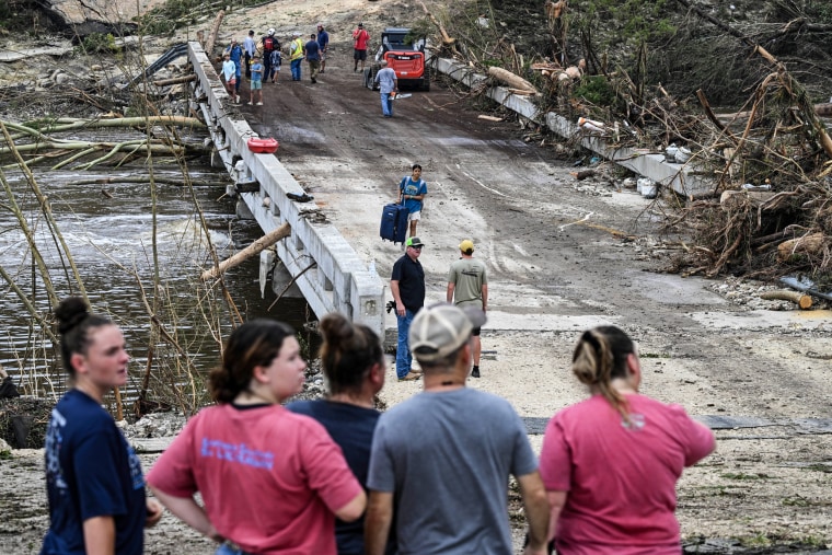 At least 51 dead in Texas floods, with dozens still missing from summer camp